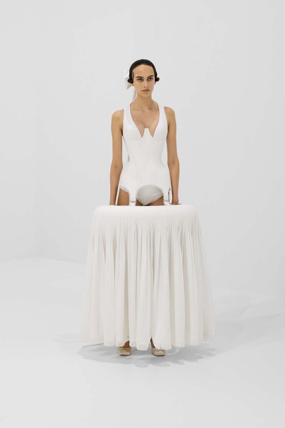 Gaultier Dares To Ask, "Would You Like To Wear a Table?"