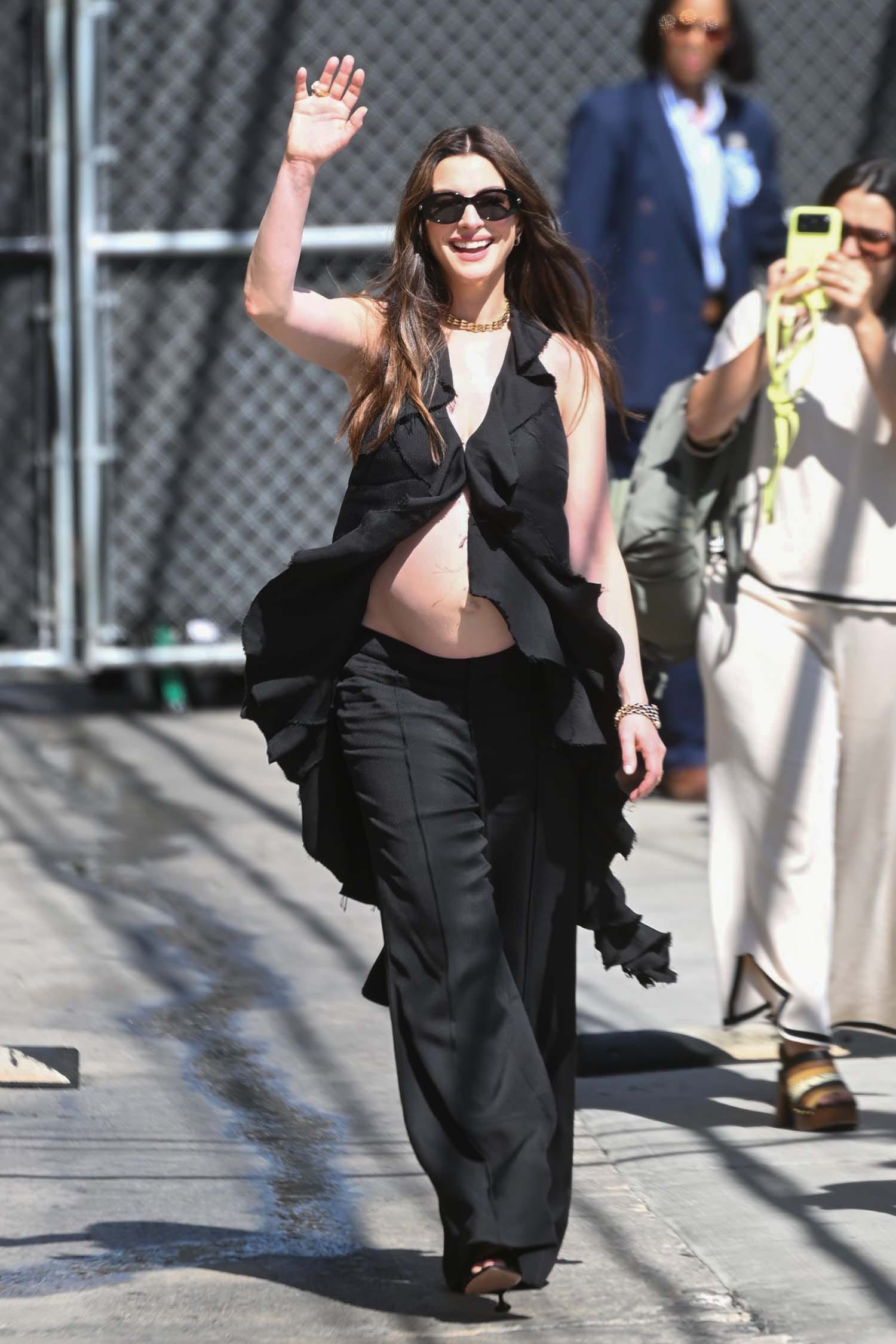 Anne Hathaway Frees the Navel Again