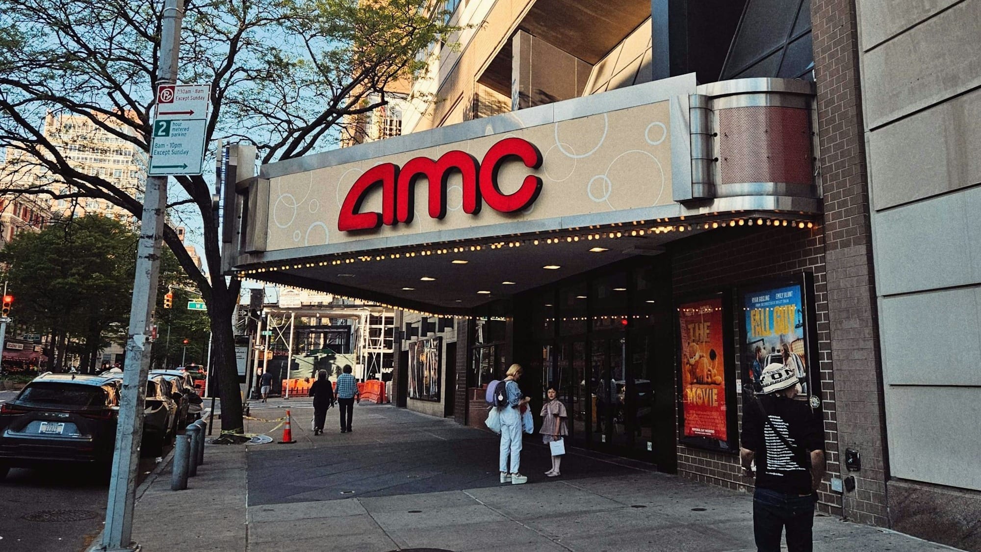 AMC secures refinancing deal and posts preliminary full-year revenue growth