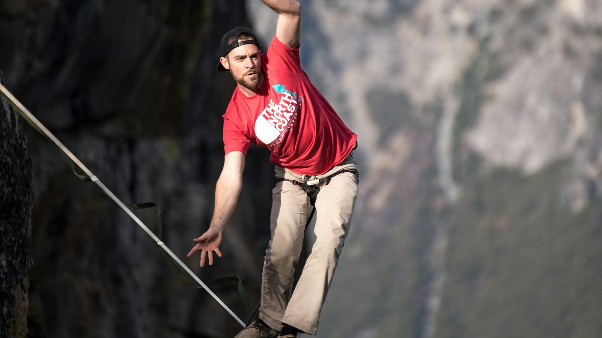 man waking on rope