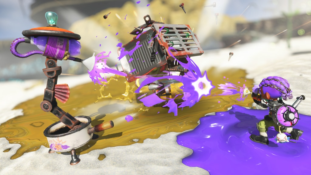 Fast-paced Splatoon Raiders combat as an Inkling blasts purple ink across a battlefield, splatting kettle-shaped Salmonid enemies and a large caged mechanical foe.