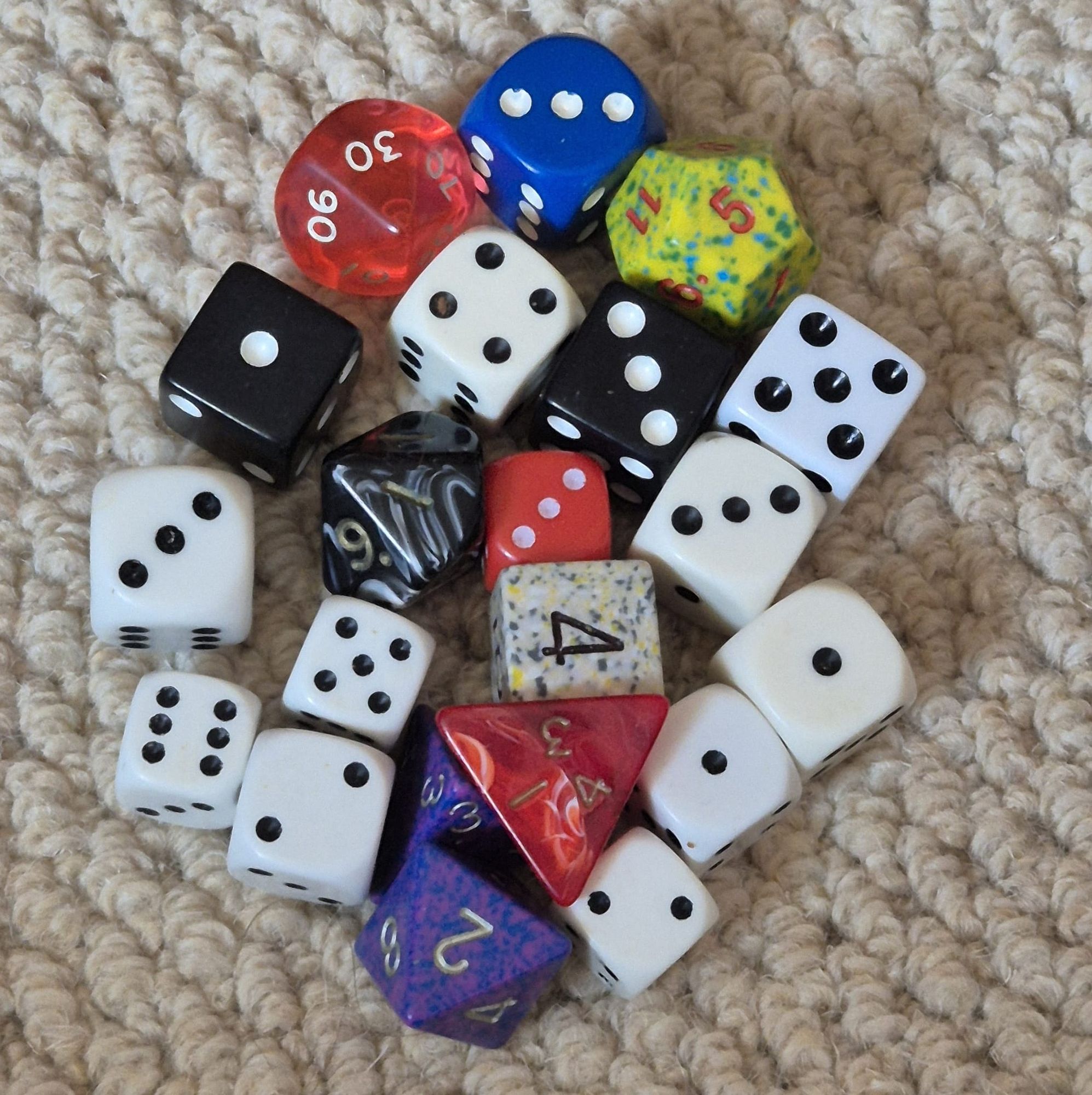 A collection of polyhedral dice in various configurations.