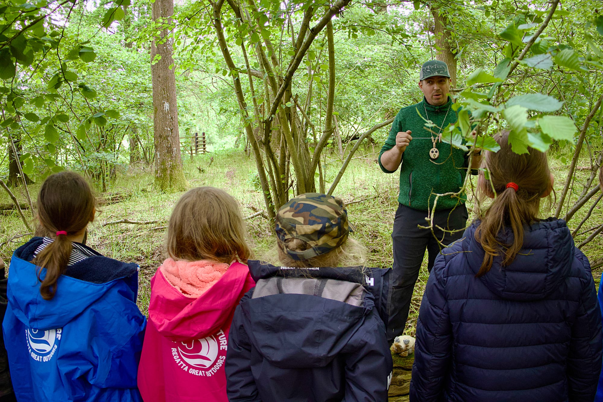 Children being briefing on rewilding activities at Knepp Estate.