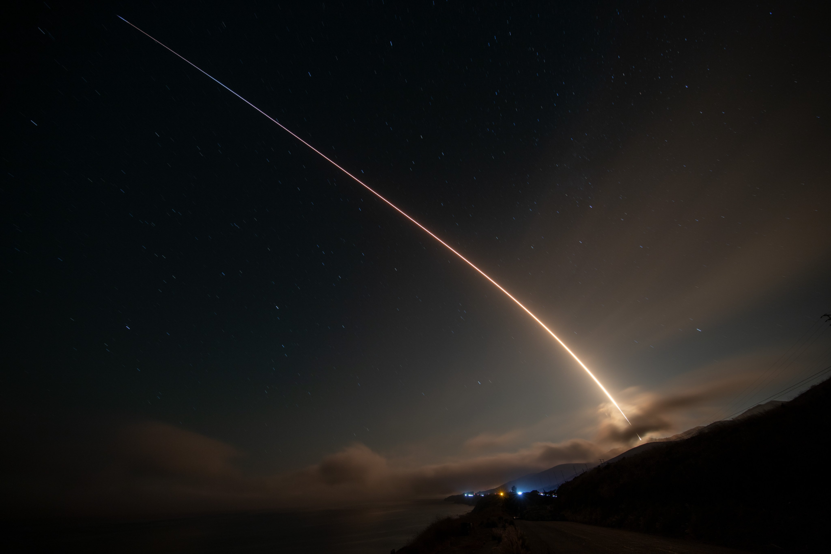 A long exposure shot of the Starlink Group 7-4 launch from SLC-4E.