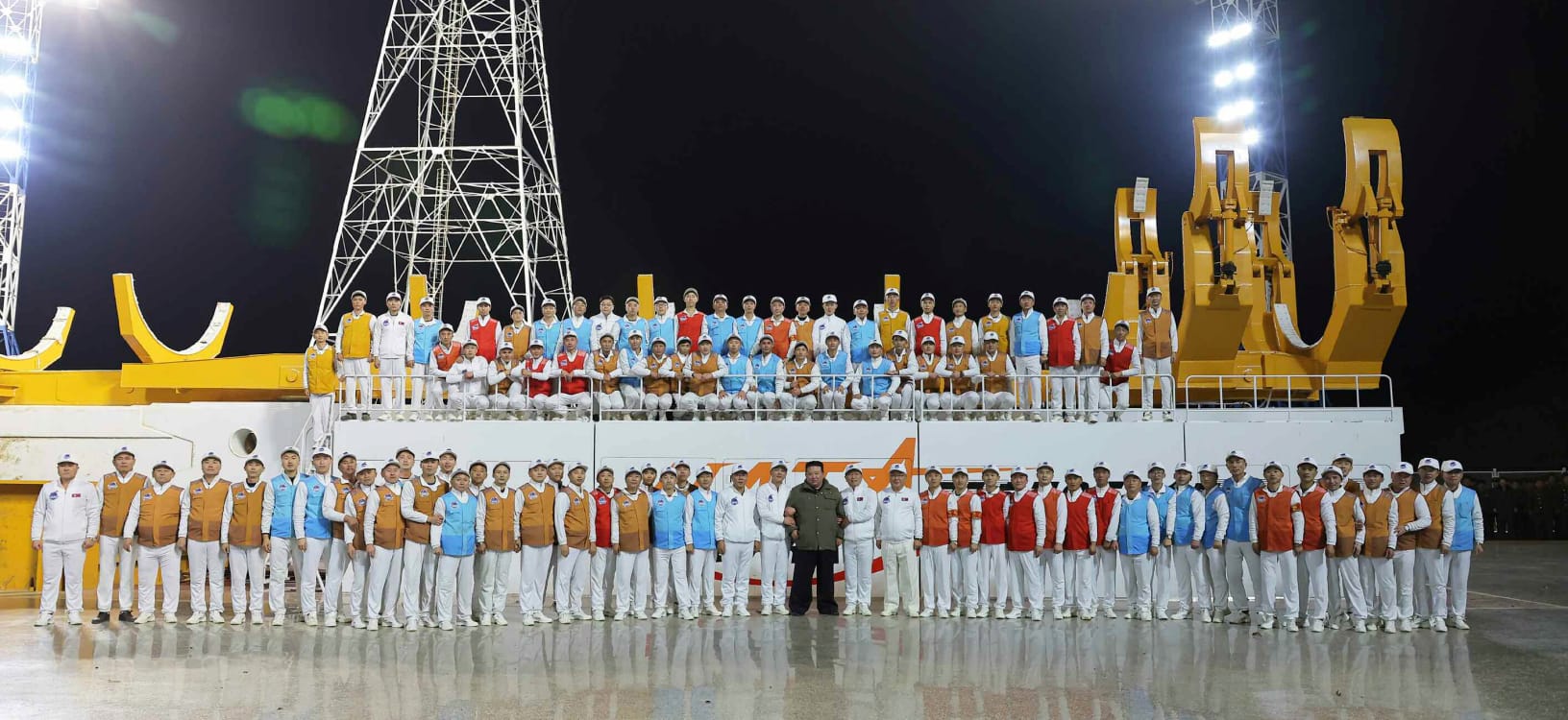 General Secretary Kim Jong Un with the scientists and technicians of Chŏllima-1.