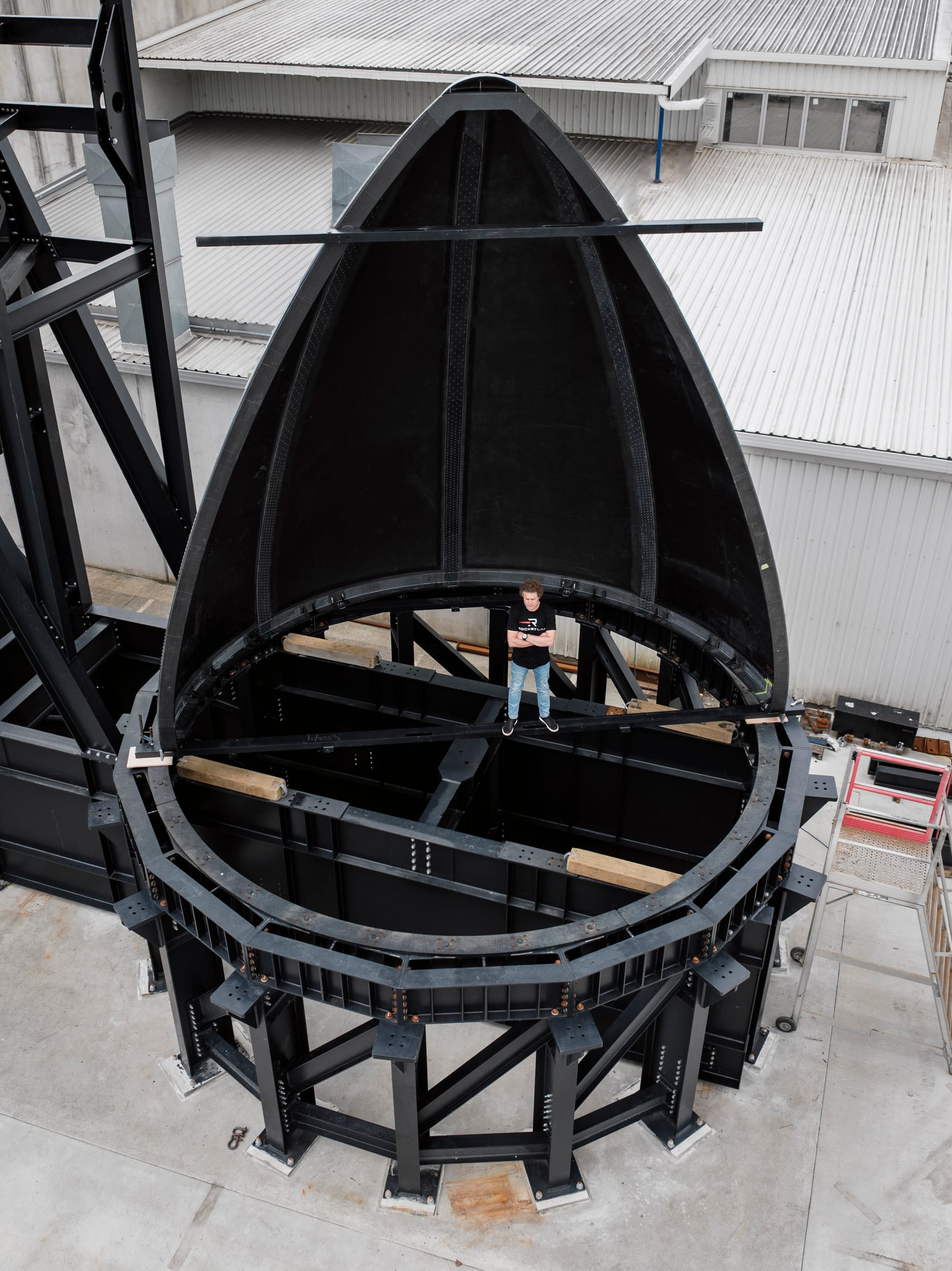 One of Neutron's fairing halves with Peter Beck, Rocket Lab's CEO, for scale. ยฉRocket Lab