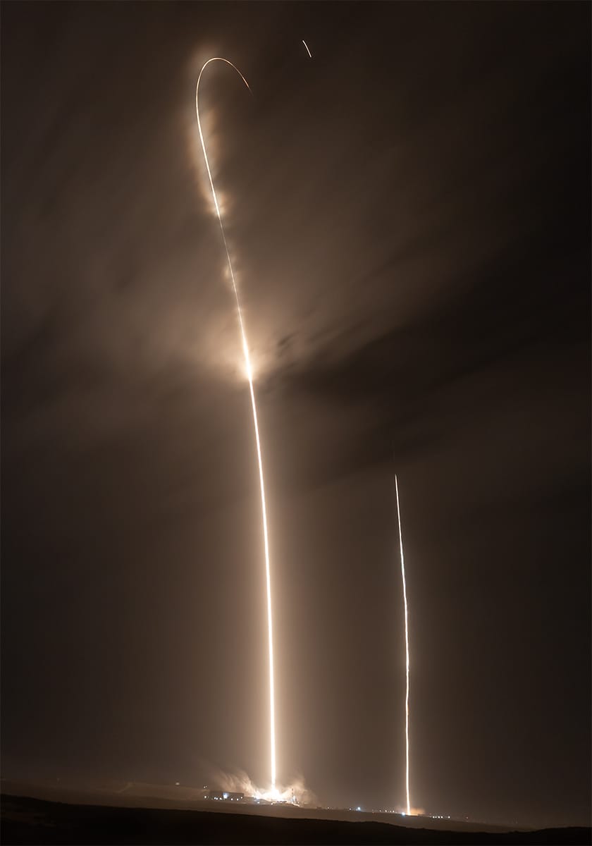 A long exposure photo of Falcon 9 lifting off for Transporter-13 and booster B1081 returning. ©SpaceX