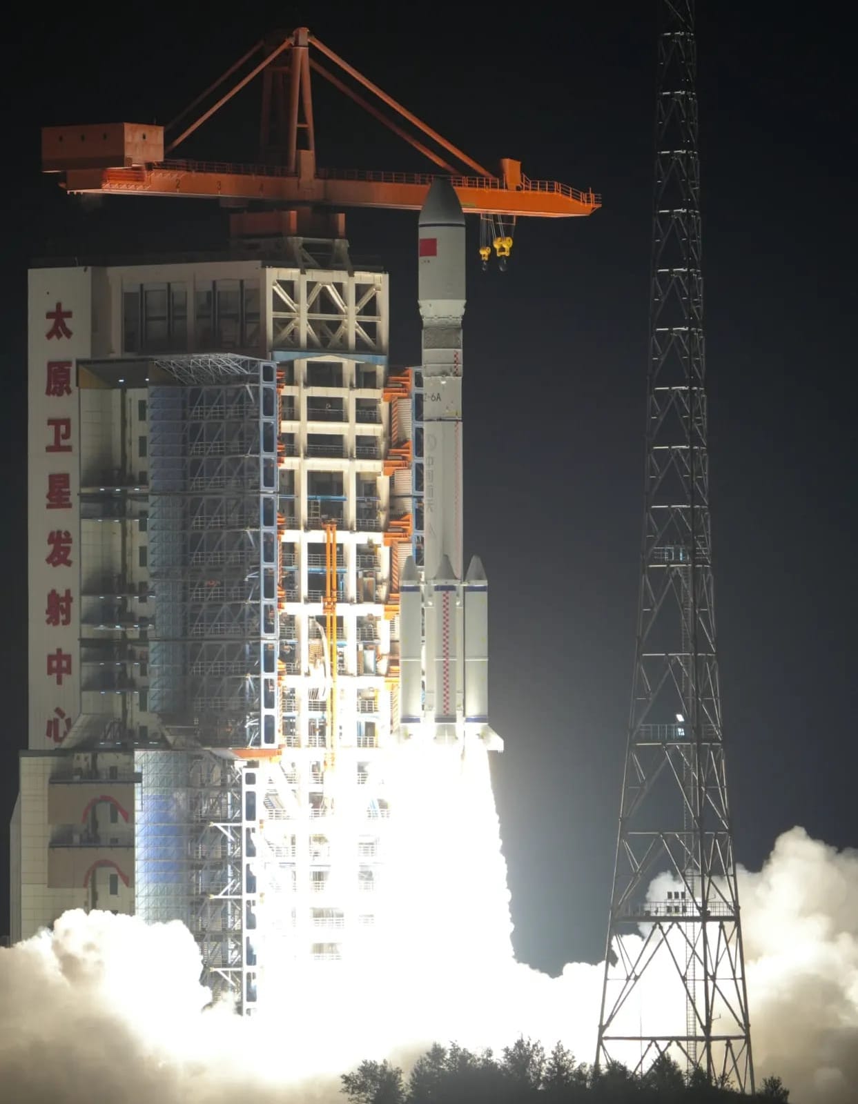 The Long March 6A Y8 vehicle lifting off from Launch Complex 9A carrying the fourth group of GuoWang satellites.
