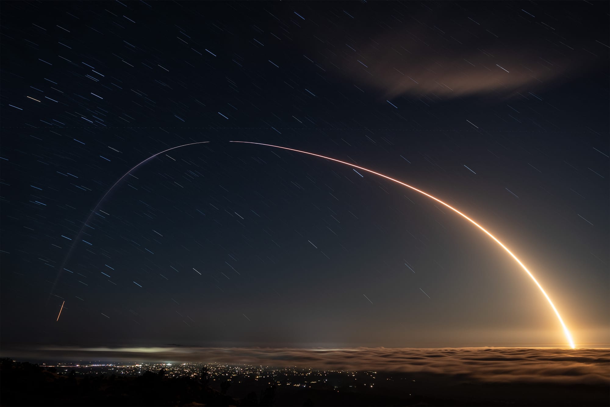 A long exposure photo of Falcon 9 flying for the Starlink Group 17-2 mission. ©SpaceX
