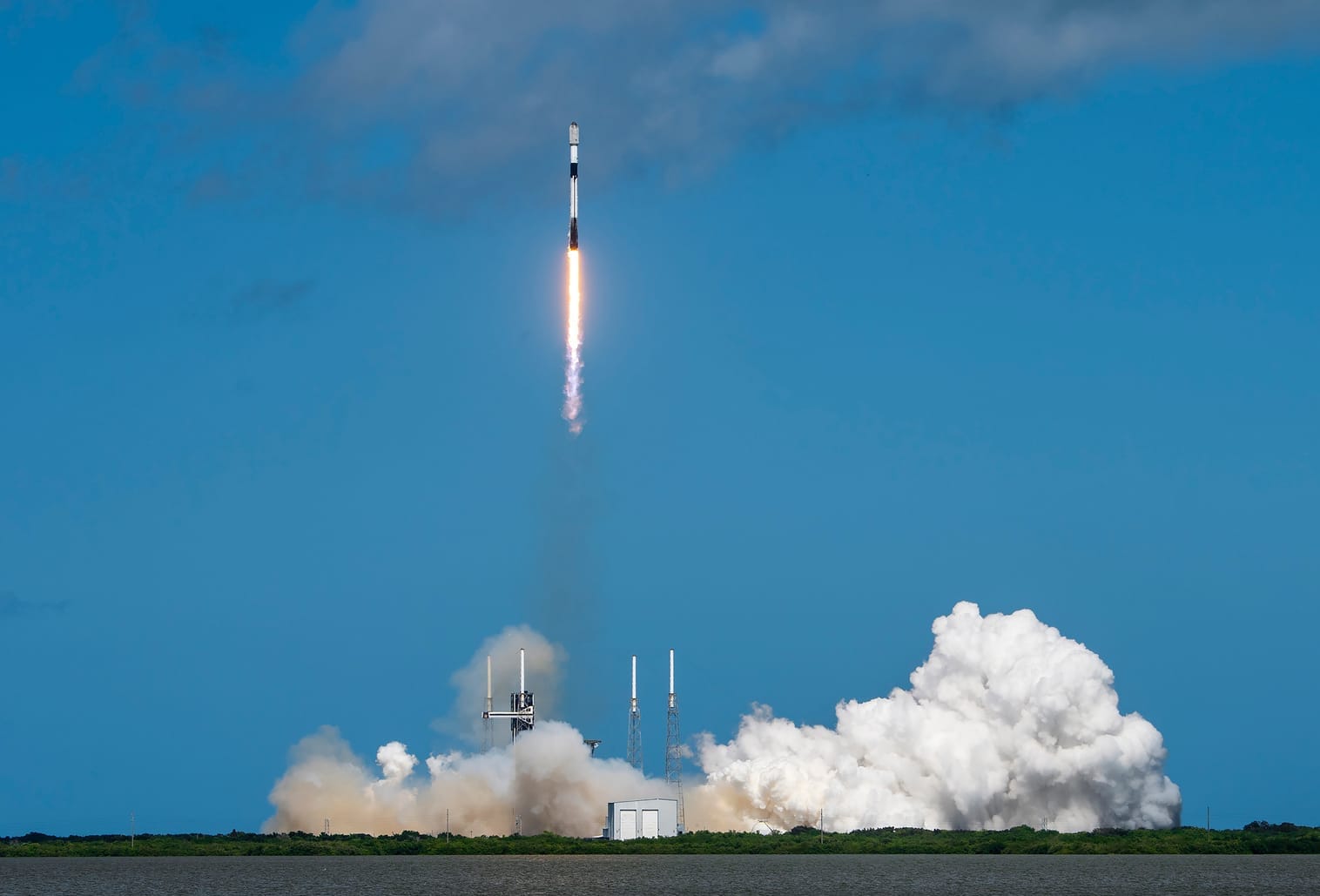 Falcon 9 seen from afar lifting off from Space Launch Complex 40 for the Starlink Group 10-17 mission. ยฉSpaceX