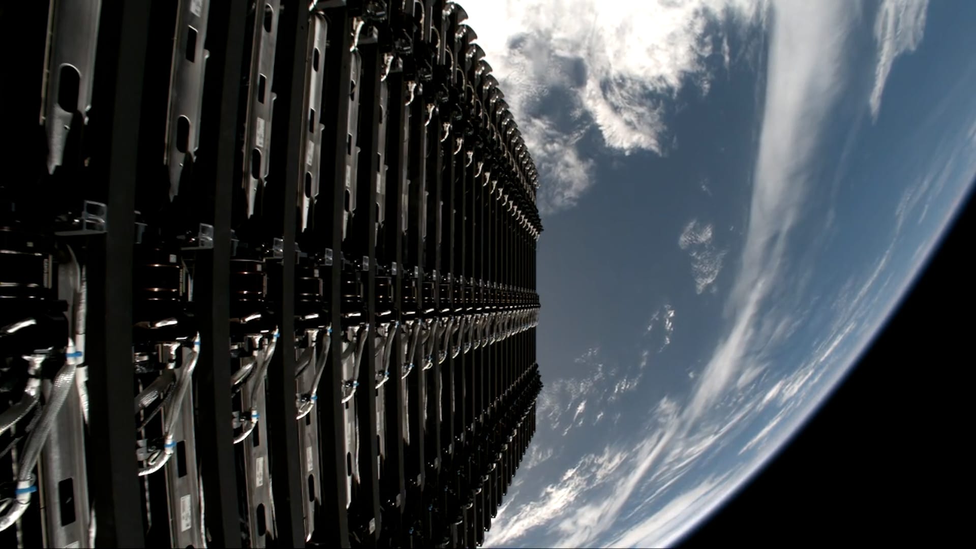 A view of twenty-seven Starlink satellites as seen from Falcon 9's second-stage before deployment. ©SpaceX