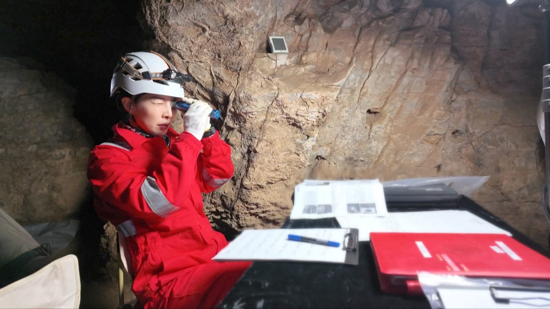 Wang Yaping working on an experiment during the cave training excercise in December 2025. ©China Manned Space Agency
