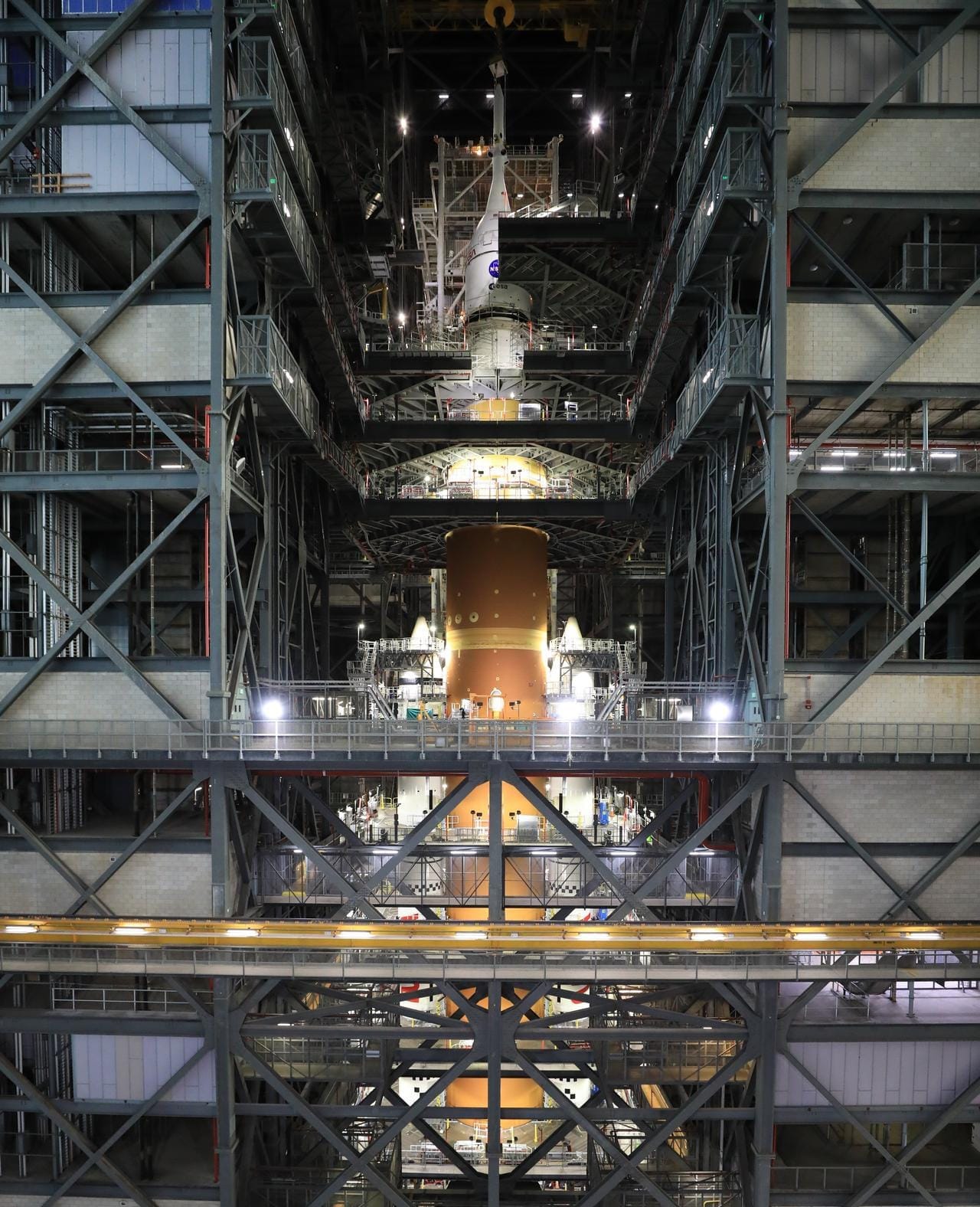 he SLS rocket for the Artemis II mission inside High Bay 3 reciving its Orion Spacecraft to complete stacking ahead of launch preparations in October 2025. ©Kim Shiflett/NASA