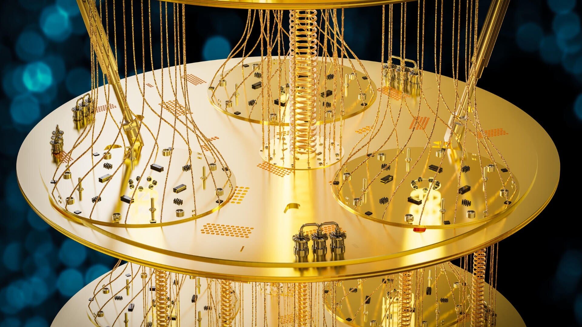 Gold-colored superconducting quantum computer hardware inside a cryogenic dilution refrigerator, featuring layered metallic plates, wiring, and cooling structures used to maintain ultra-cold temperatures for quantum computing.