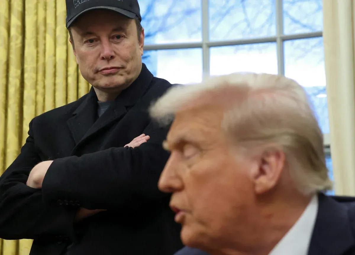 Musk observes Trump during a press conference on February 12th 2025. ©Reuters