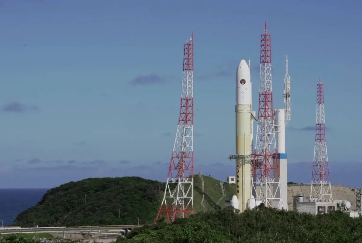 Japan’s H3-24L rocket carrying the MMX mission stands on the launch pad at Tanegashima Space Center ahead of its launch toward Mars’ moons.