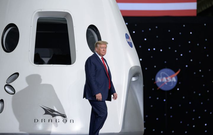 Trump walks on stage following the launch of Demo-2 in 2020. ©NASA