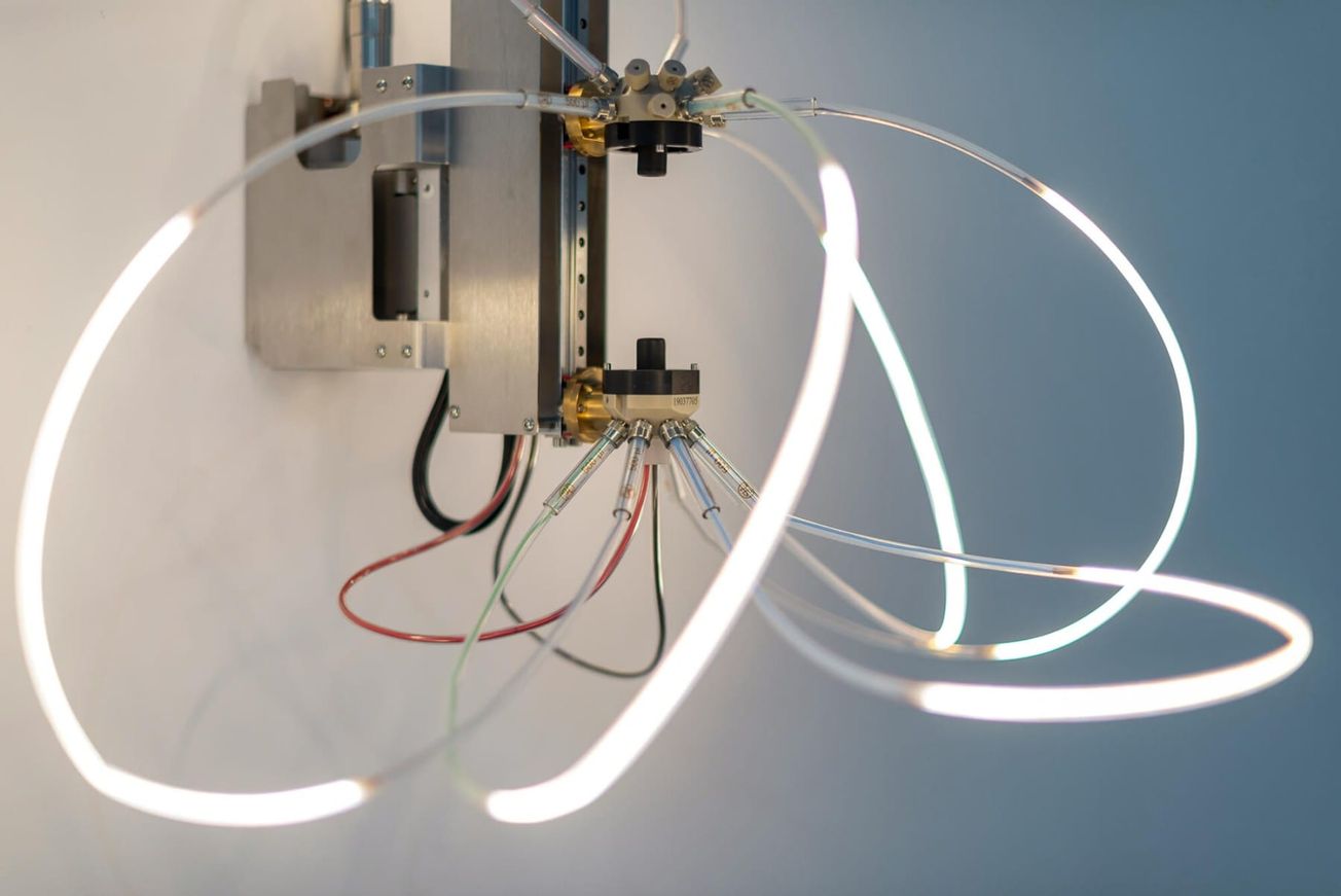 Fluid Dynamics, Lighting Objects from Medical Manufacturing Waste