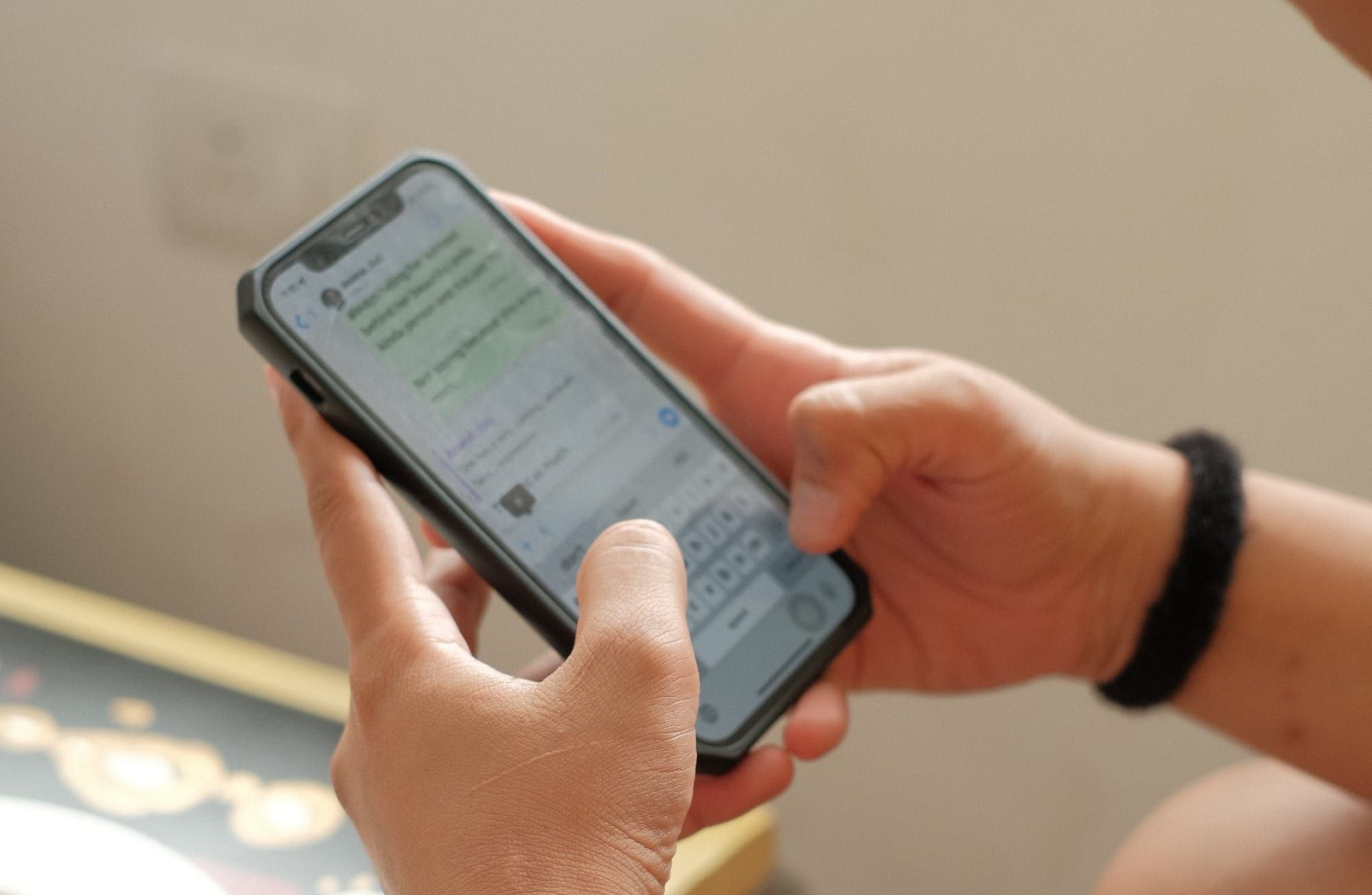 How to React to a Message on WhatsApp Post image