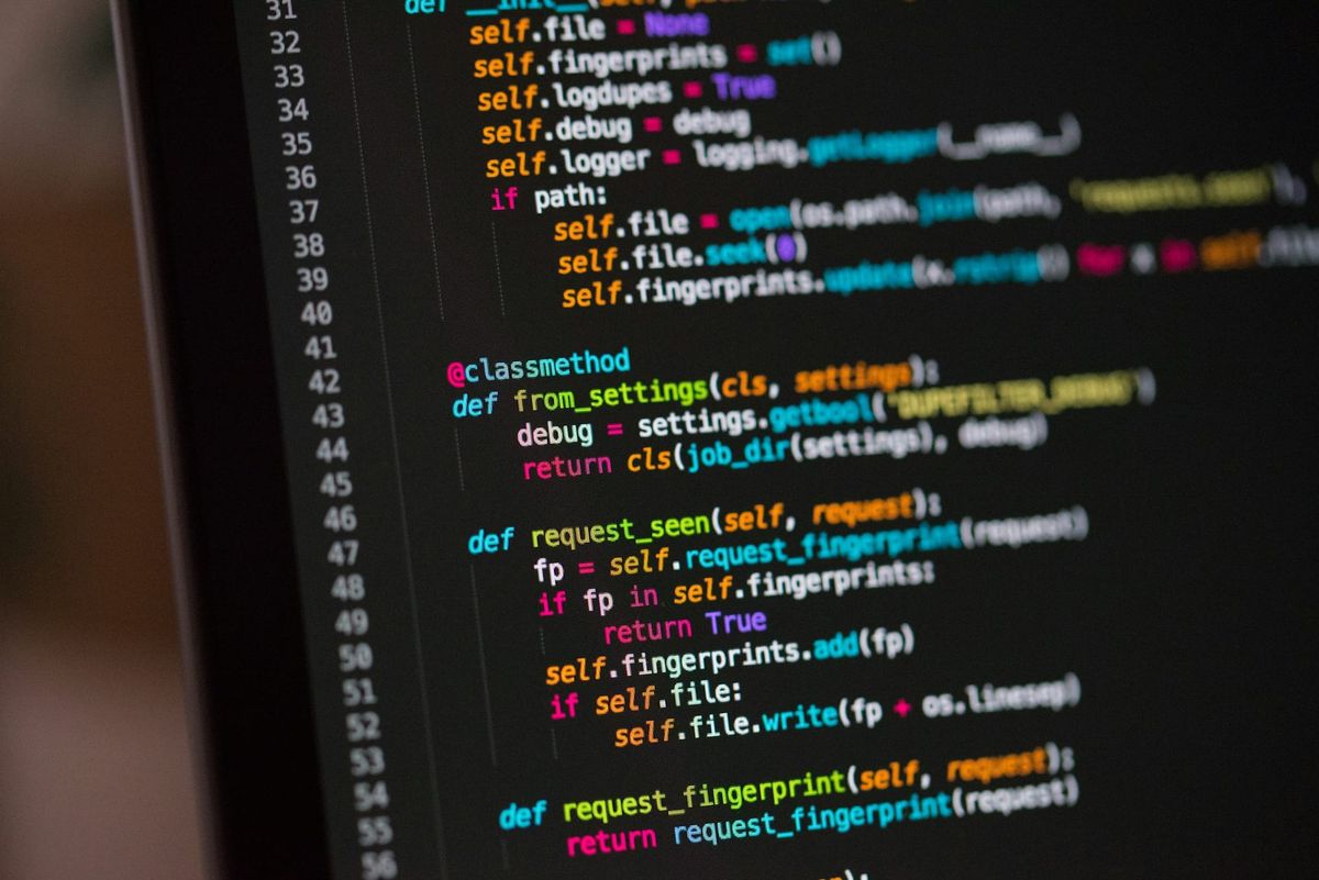 Lines of source code on a dark computer screen