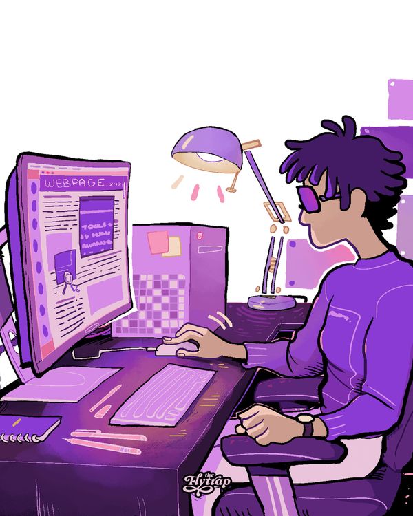 A Black person with short, thick hair and prescription glasses sits at an organized workstation, using a magnification app to navigate a webpage.