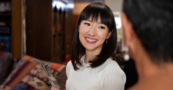 A smiling Marie Kondo on the set of her popular television show. 
