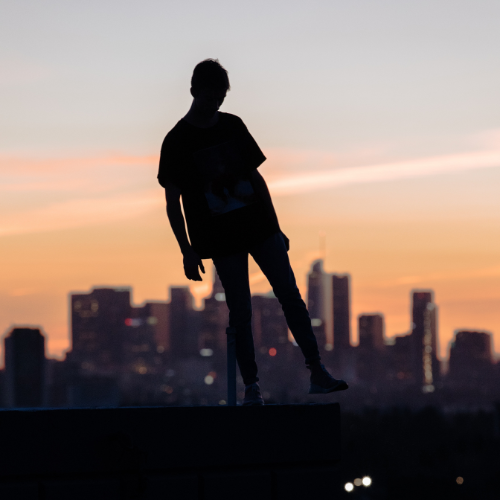 GPD Mistakes Man Dancing on Top of Downtown Parking Garage for Suicide Attempt