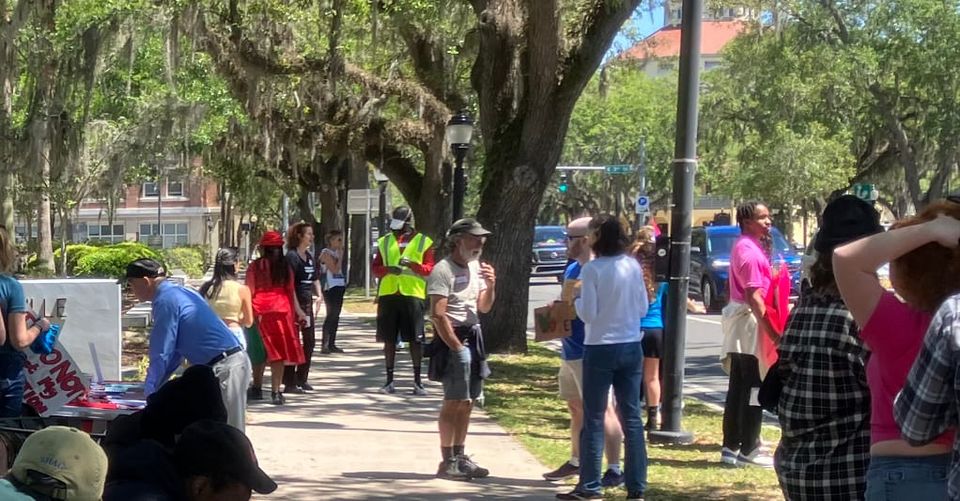 Activists Rally for Expanded Abortion Access, Urging Support for Amendment 4 Outside City Hall