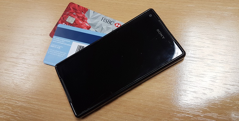 Smartphone and bank cards'