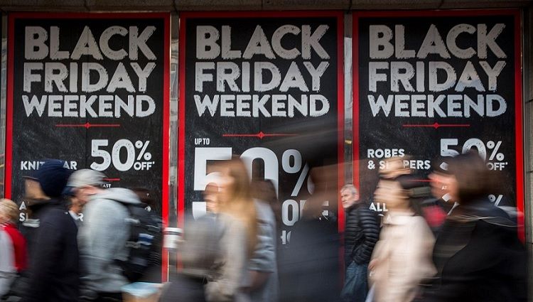 Black Friday Weekend posters in shop window