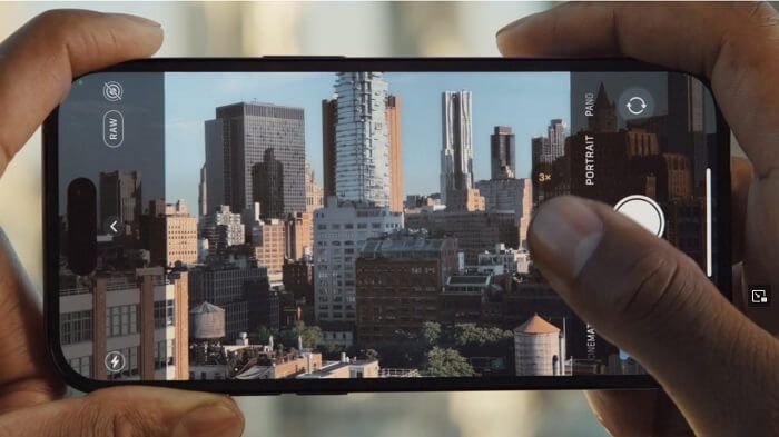 Someone holing a iPhone about to take a photo