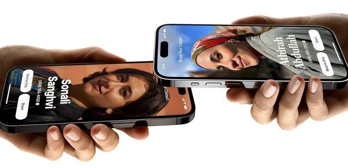 two iphones next to eachother so they can airdrop nummbers email adresses or contact posters