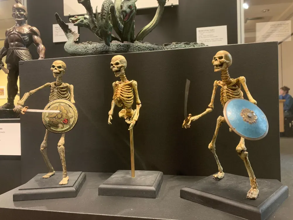 Three skeleton models from Jason and the Argonauts. Behind them are the model of the Colossus and of the Hydra.