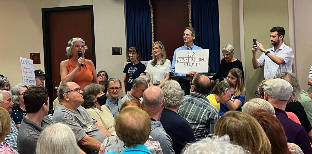 Wittman constituents host town hall in his absence to address immigration, federal funding concerns