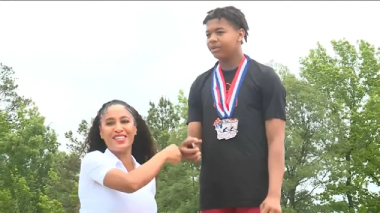 Olympian Queen Harrison Claye returns home to inspire next generation of athletes