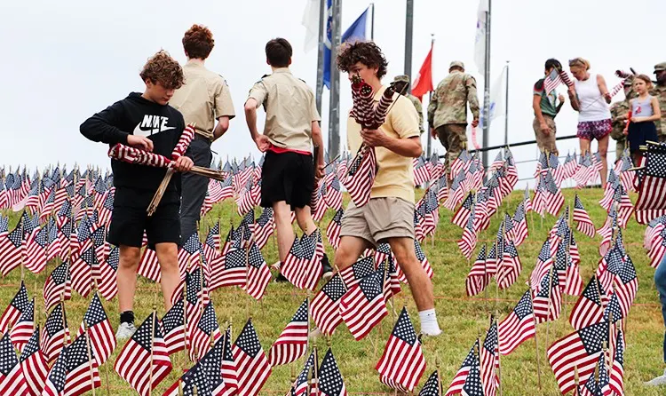 Virginia War Memorial seeks volunteers to place flags for 'Hill of Heroes Celebration'