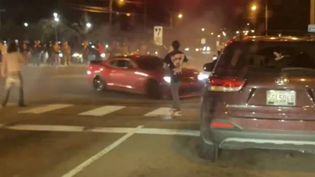 Witnesses: Drivers did donuts, crowds threw eggs during street takeover near St. Mary’s Hospital