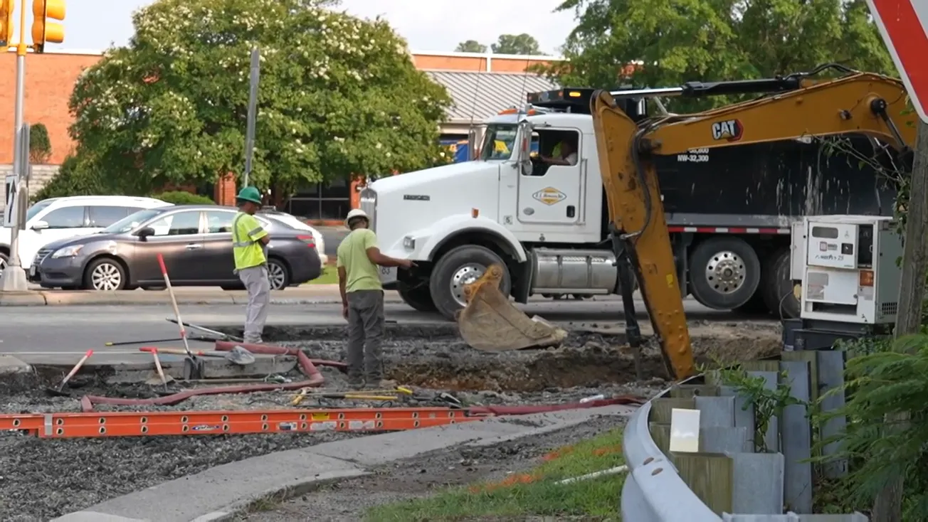 Water main break on Gaskins Road leads to flooded parking lots, closes lanes until next week