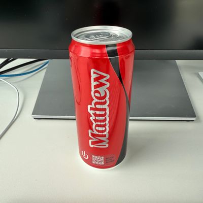 A Coke Zero can with the name 'Matthew' on it. 
