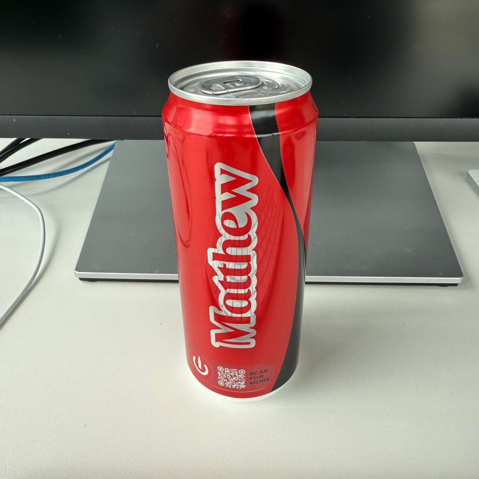 A Coke Zero can with the name 'Matthew' on it. 