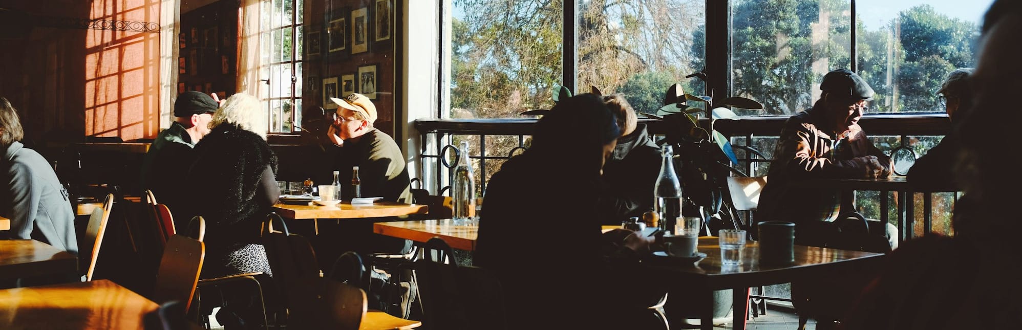 person sitting on chairs with tables