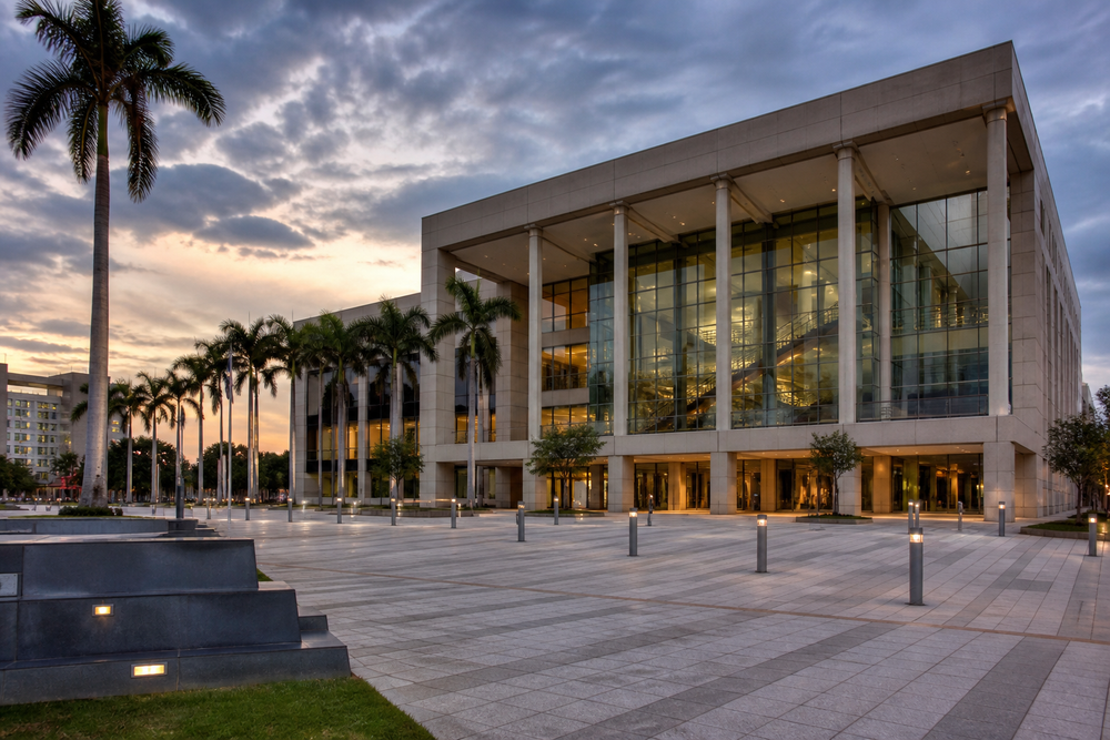 Evening exterior of a Palm Beach County governmental center — Sept. 15 final millage/budget hearing setting (editorial stand-in; prefer Weisman 