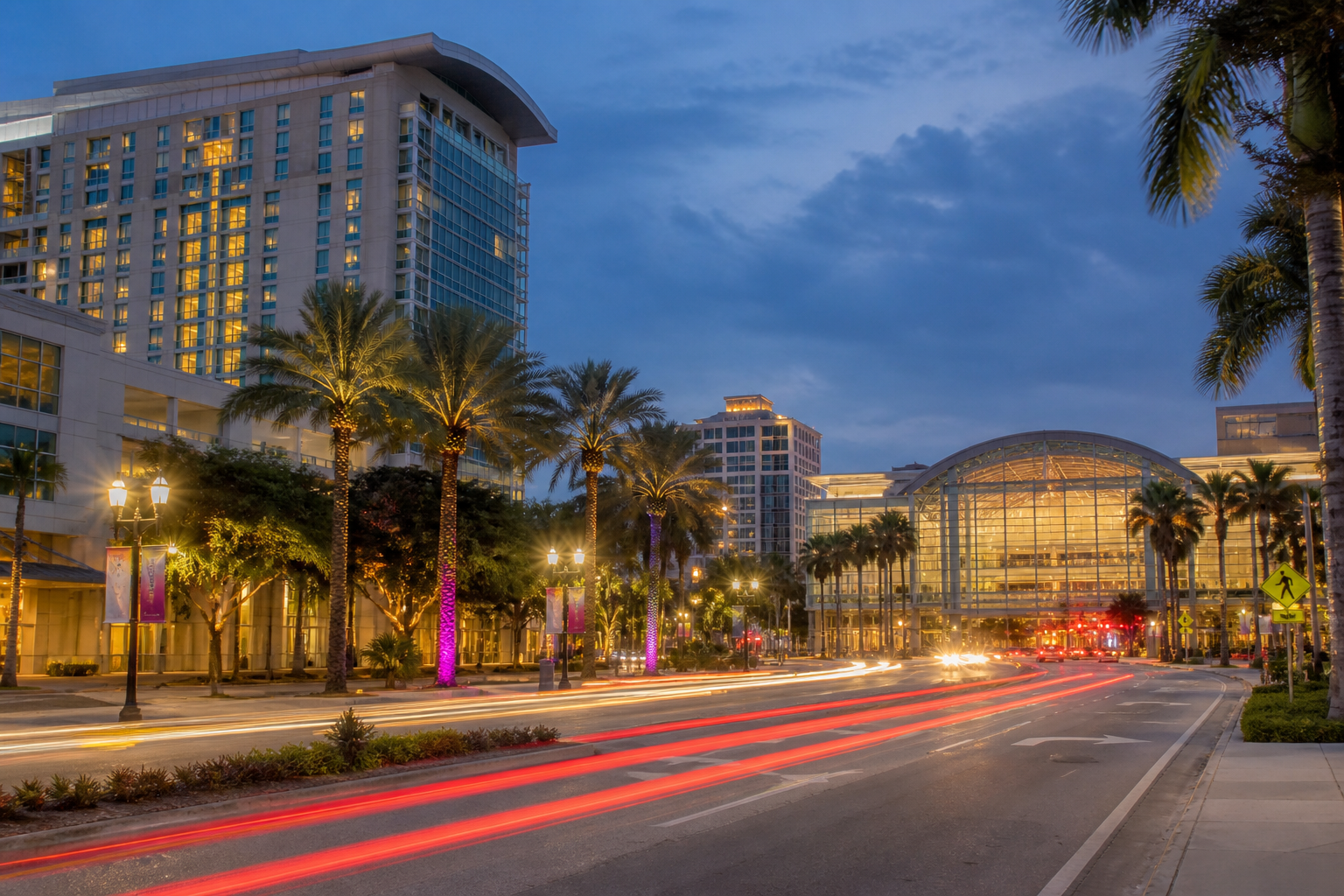 Downtown West Palm Beach Okeechobee corridor at dusk — Hilton / Convention Center setting for Film Florida Week + GC26.