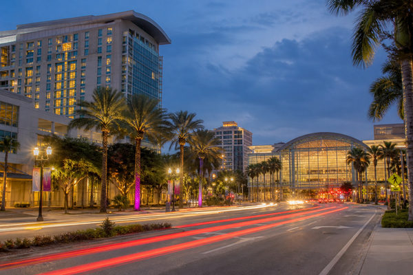 Downtown West Palm Beach Okeechobee corridor at dusk — Hilton / Convention Center setting for Film Florida Week + GC26.