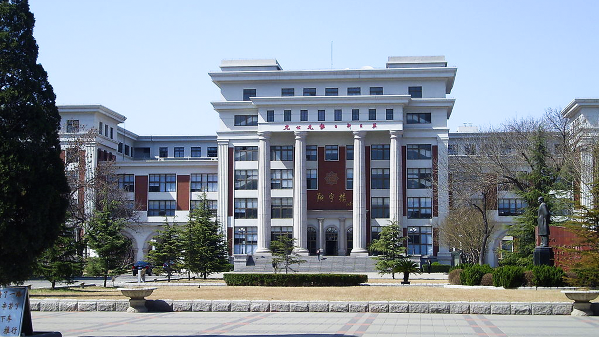 Tianjin Nankai High School International Department building with classical columns and a formal entrance.