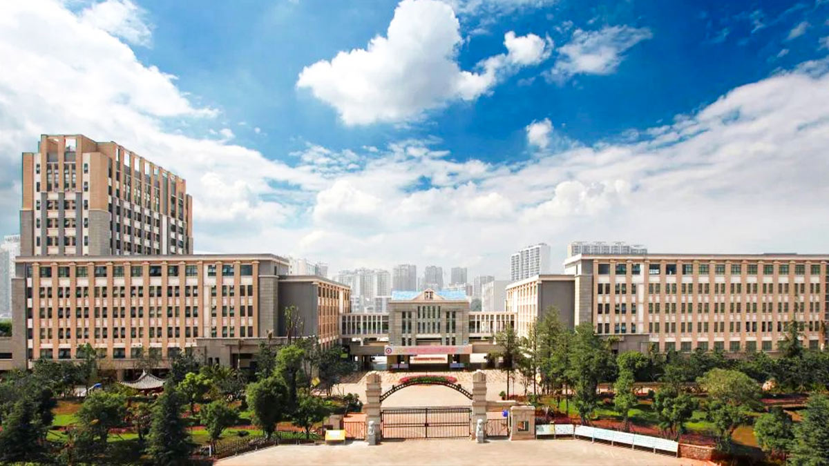 Kunming Number One High School International Education campus with multiple buildings and landscaped grounds.