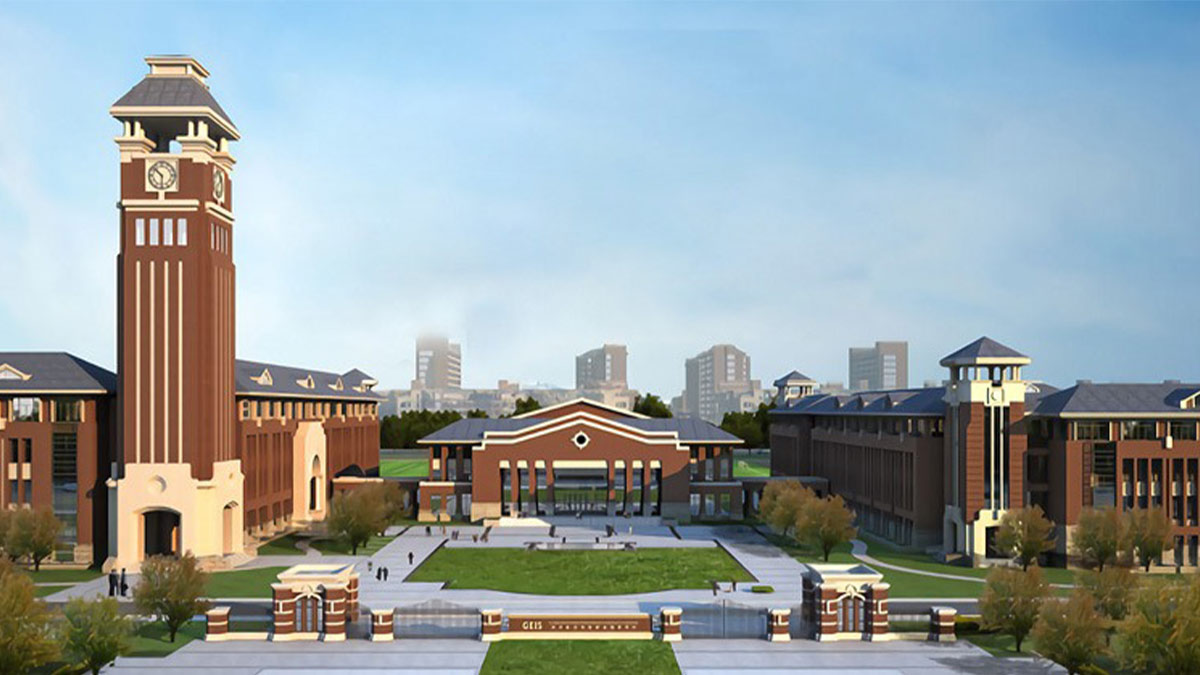 Glocal Elite International School campus featuring prominent clock tower and collegiate-style brick architecture.