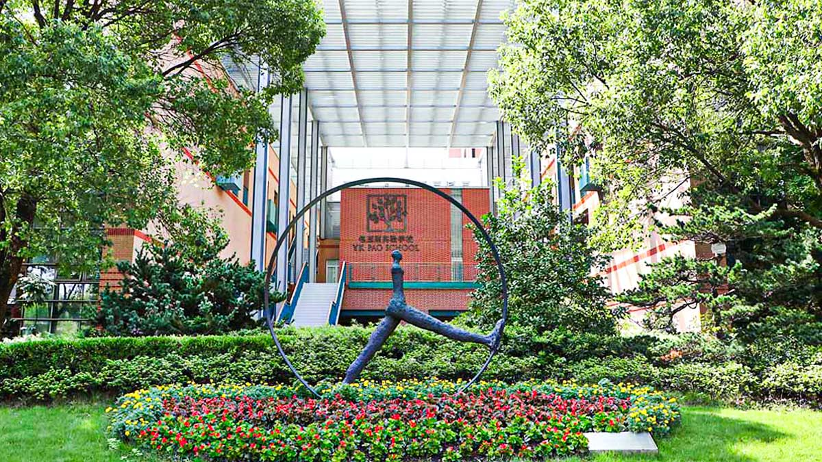 YK Pao School campus entrance featuring modern architecture, landscaped gardens and distinctive sculptural artwork.