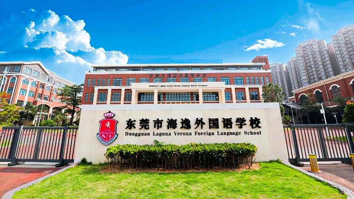 Dongguan Laguna Verona Foreign Language School entrance sign with red brick buildings