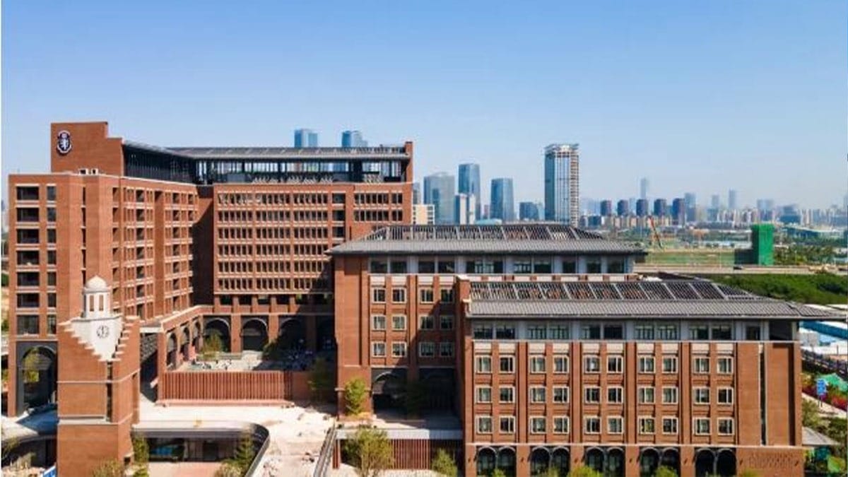 École Française Internationale de Shenzhen EFIS brick campus with skyline backdrop